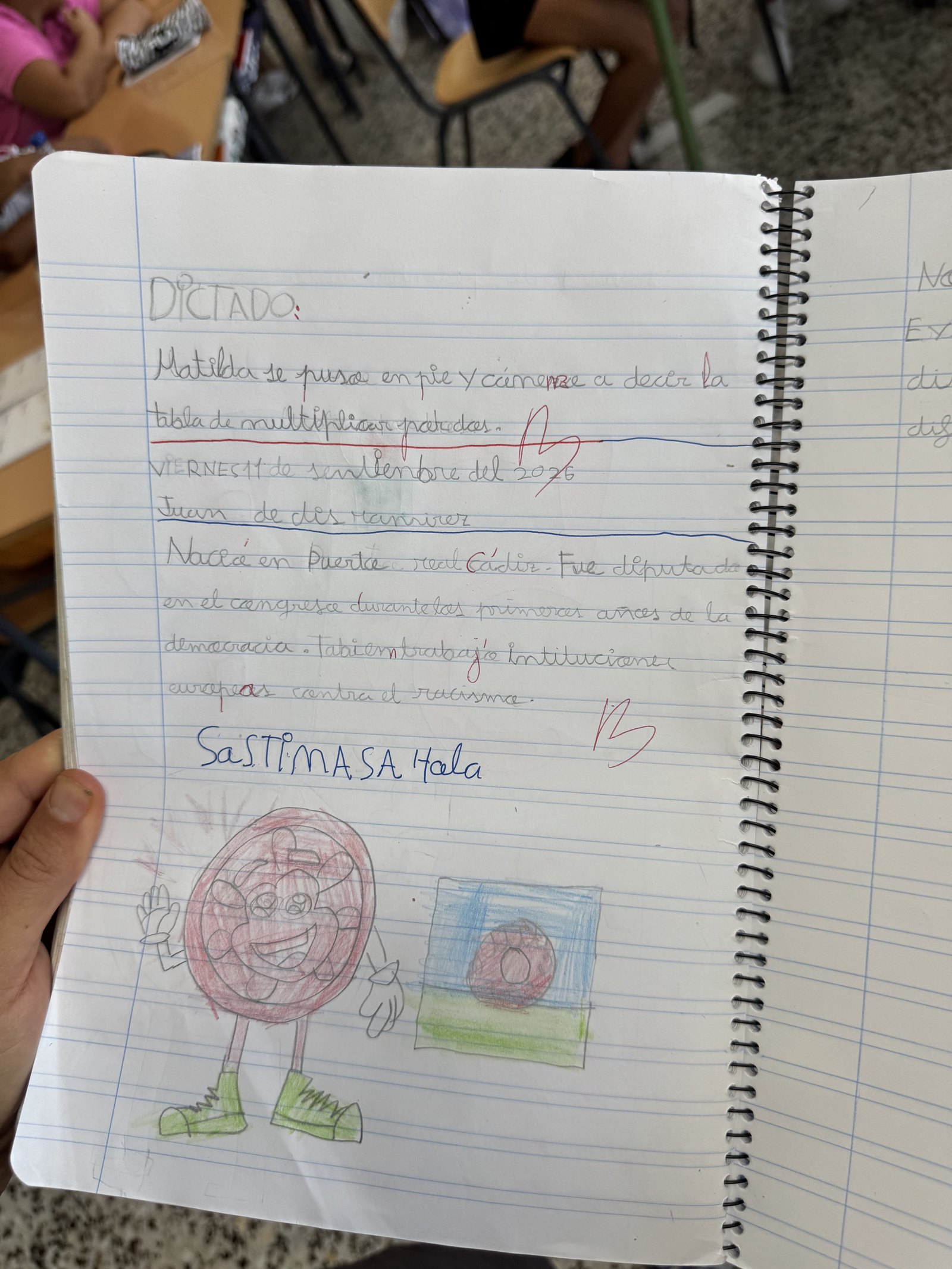 Cuaderno de un alumno con el dictado de la biografía de la primera semana y un dibujo de Romanín